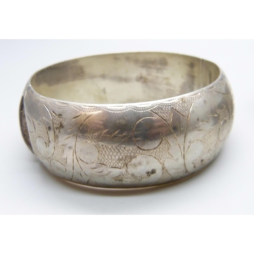 7115 - Three silver bangles, 87g