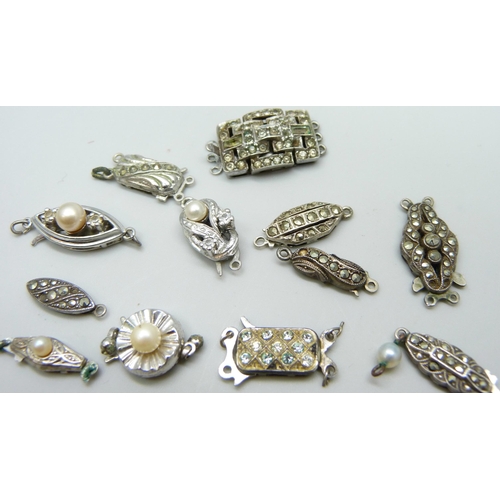 7129 - A collection of silver clasps, 28g