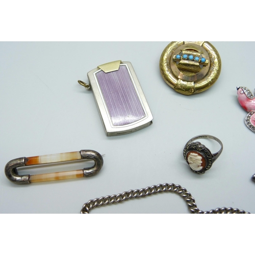 7133 - A collection of items including an Art Deco enamelled lighter/striker, a brooch in the form of a bir... 