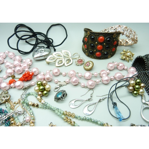 7137 - Sixteen pairs of vintage clip on earrings and assorted jewellery