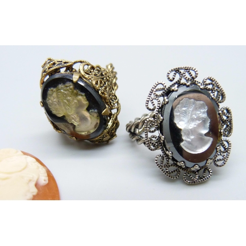 7142 - Cameo brooches including one hallmarked silver and a white metal example, loose cameos and rings