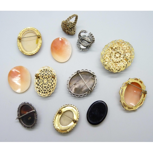 7142 - Cameo brooches including one hallmarked silver and a white metal example, loose cameos and rings