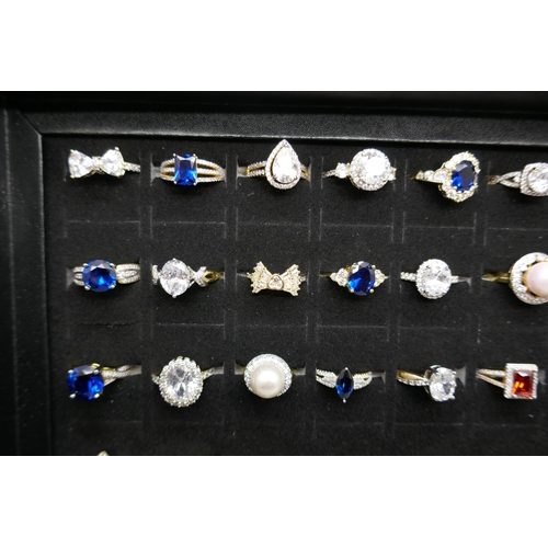 7150 - 50 costume rings in a display box