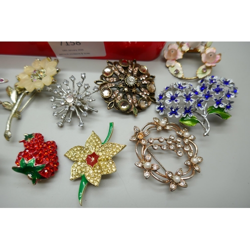 7158 - A collection of 52 costume brooches