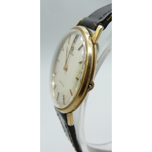 7185 - A 9ct gold cased Omega Geneve wristwatch, lacking crown, 32mm case