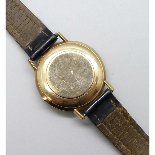 7185 - A 9ct gold cased Omega Geneve wristwatch, lacking crown, 32mm case