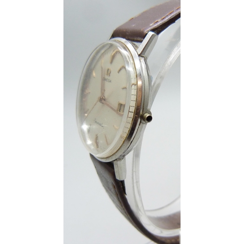 7187 - An Omega Seamaster wristwatch with calendar dial, lacking crown, 34mm