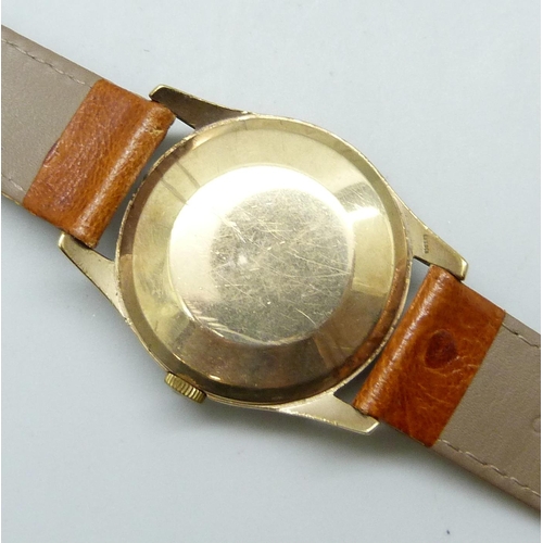 7190 - An Omega 9ct gold cased wristwatch, 33mm including crown