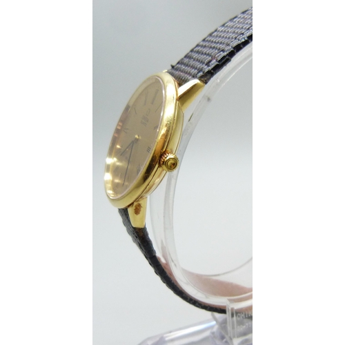 7192 - An 18ct gold cased Omega De Ville quartz wristwatch, 35mm including crown