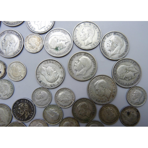 7210 - A collection of shillings/sixpence/threepence, all pre 1947, all VF or better, weight approximately ... 