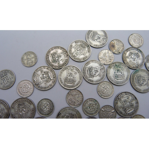 7210 - A collection of shillings/sixpence/threepence, all pre 1947, all VF or better, weight approximately ... 