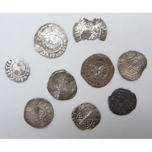 7219 - A collection of nine hammered cross silver pennies