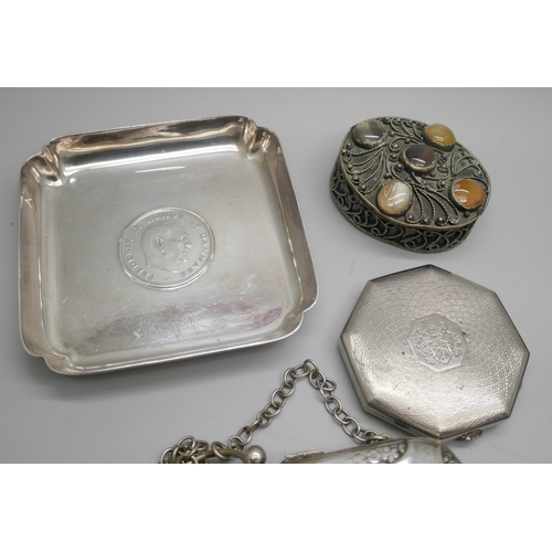 7244 - Two silver plated purses, an Eastern pot set with stones, a plated dish, compact, and a letter opene... 