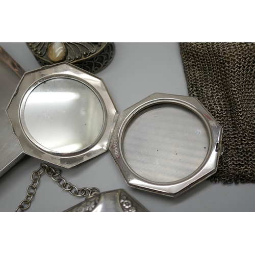 7244 - Two silver plated purses, an Eastern pot set with stones, a plated dish, compact, and a letter opene... 