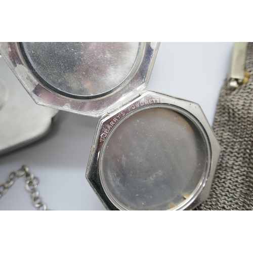 7244 - Two silver plated purses, an Eastern pot set with stones, a plated dish, compact, and a letter opene... 