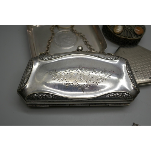 7244 - Two silver plated purses, an Eastern pot set with stones, a plated dish, compact, and a letter opene... 