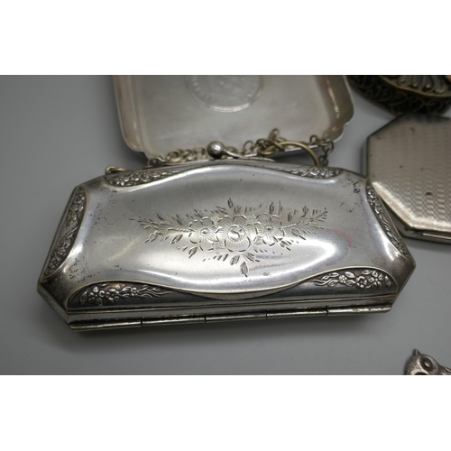 7244 - Two silver plated purses, an Eastern pot set with stones, a plated dish, compact, and a letter opene... 