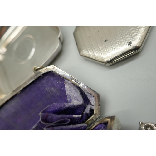 7244 - Two silver plated purses, an Eastern pot set with stones, a plated dish, compact, and a letter opene... 