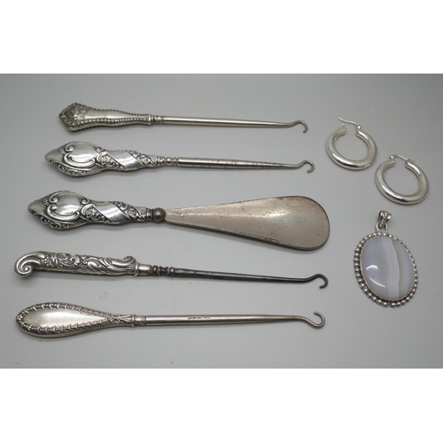 7248 - Silver handled button hooks, silver earrings and a silver stone set pendant