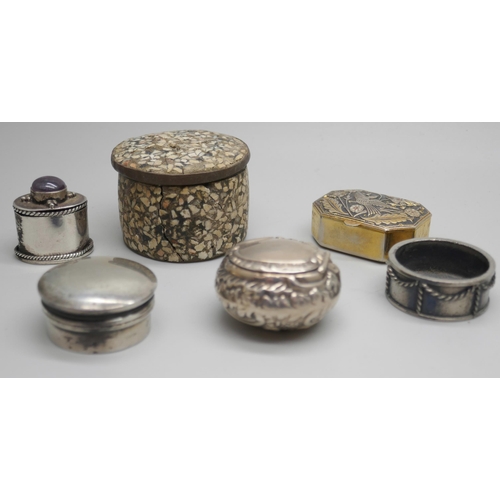 7249 - A Victorian embossed silver pill box, Birmingham 1895, another silver pill box, Birmingham 1919, and... 