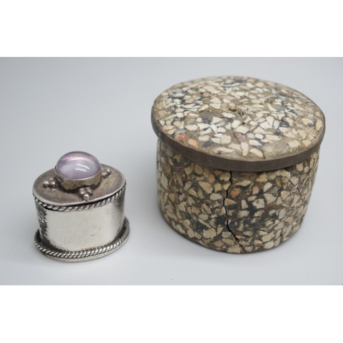 7249 - A Victorian embossed silver pill box, Birmingham 1895, another silver pill box, Birmingham 1919, and... 