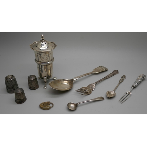 7258 - A collection of silver items including a pepper, spoons, fork, three thimbles, etc., 104g