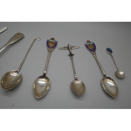 7259 - A collection of silver spoons including enamelled examples, a Georgian caddy spoon, another Georgian... 