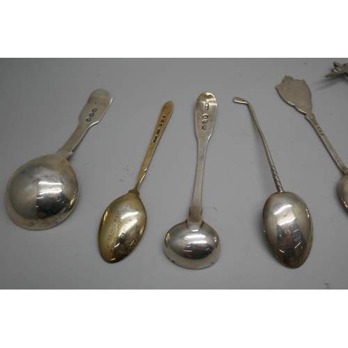 7259 - A collection of silver spoons including enamelled examples, a Georgian caddy spoon, another Georgian... 