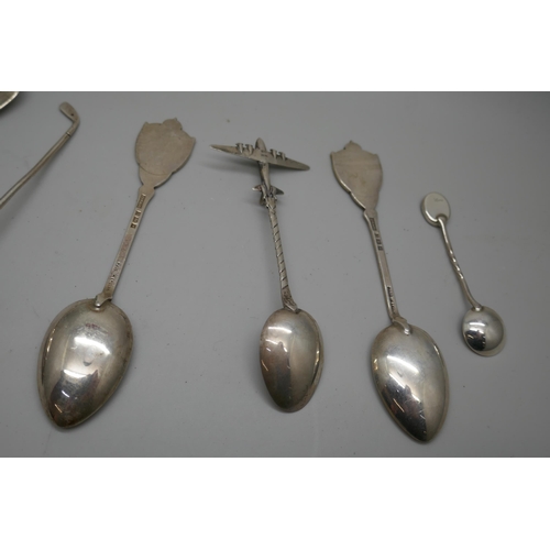 7259 - A collection of silver spoons including enamelled examples, a Georgian caddy spoon, another Georgian... 