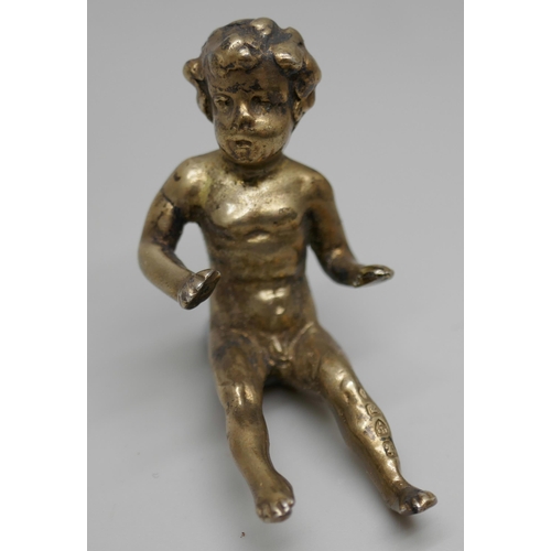 7262 - A Victorian silver model of a baby, Chester 1900, 33g, 4.5cm