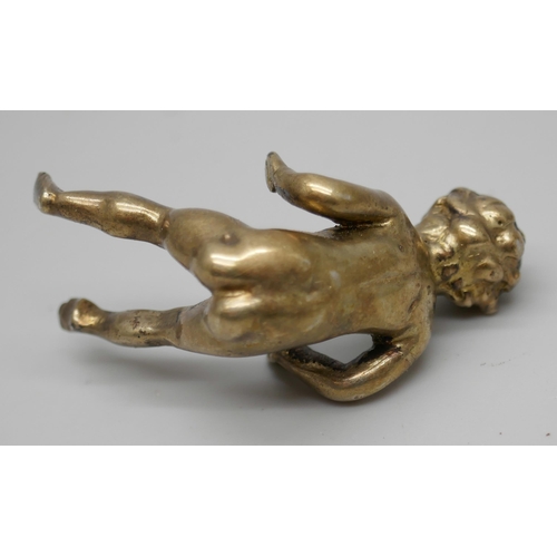 7262 - A Victorian silver model of a baby, Chester 1900, 33g, 4.5cm