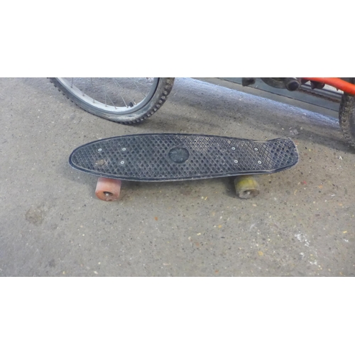 5172 - A BTWIN children's bike and a skateboard with flashing wheels