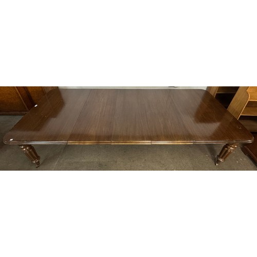 79 - A Victorian mahogany extending dining table, 75 cms h, 157cms l (300cms fully extended), 119cms w