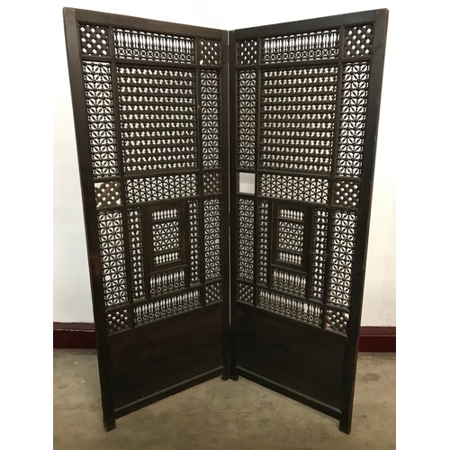 98 - A late 19th/early 20th Century Moorish stained pine folding dressing screen