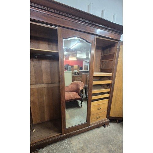 84 - A late Victorian walnut wardrobe