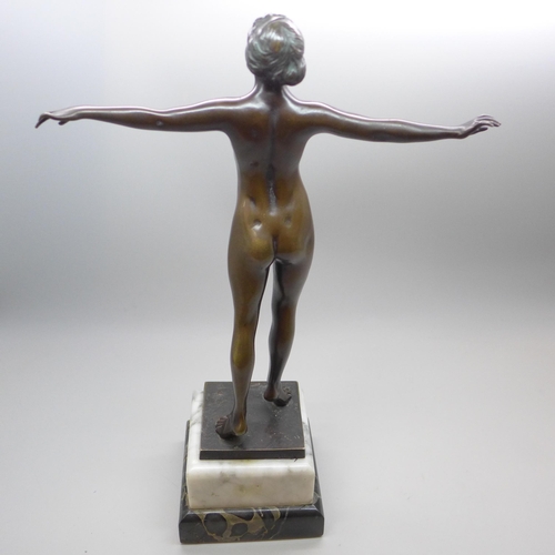 2001 - An Art Deco bronze figure of a female nude, on grey marble socle, 27.5cms h, one corner of the black... 