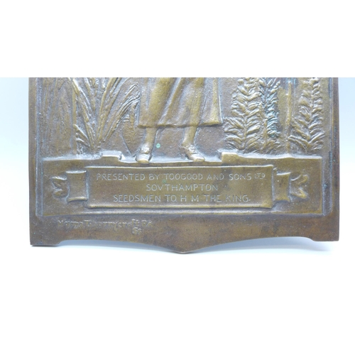 2002 - A bronze plaque depicting a lady, 