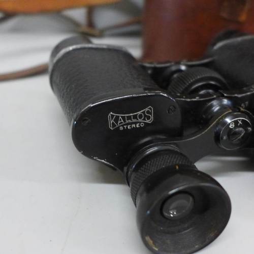 2043 - A pair of French made binoculars, a Kodak Retinette camera in leather case and a Canon EOS 650 with ... 