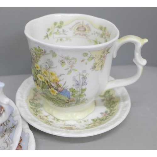 2049 - Four Royal Doulton Brambly Hedge cups, four pin dishes and a Winter trio