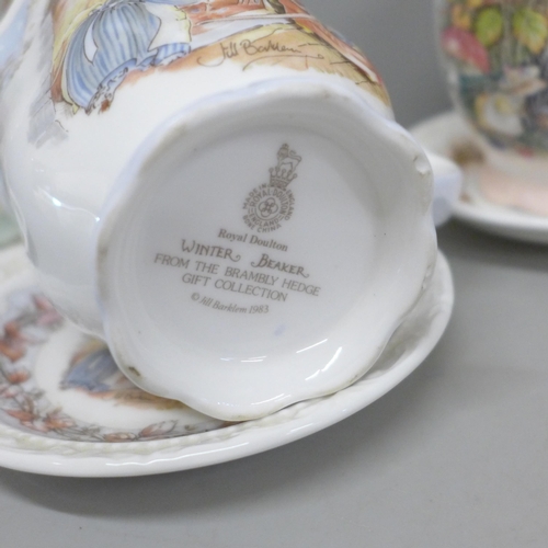 2049 - Four Royal Doulton Brambly Hedge cups, four pin dishes and a Winter trio