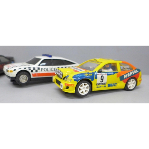 2053 - Five Scalextric model cars, four rally and Police Patrol