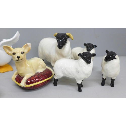 2085 - A Beswick model ram and three lambs, a/f, Beswick dog, a/f, two models of fish, two models of frogs,... 