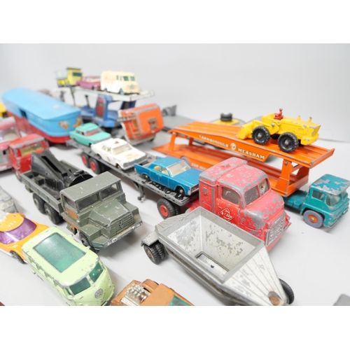 2092 - A collection of die-cast model vehicles, play worn, including Meccano, Dinky, Corgi, Matchbox, etc.