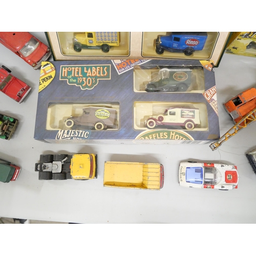 2097 - A box of die-cast model vehicles, mainly Corgi, Dinky and Matchbox, Play worn and four boxed vehicle... 