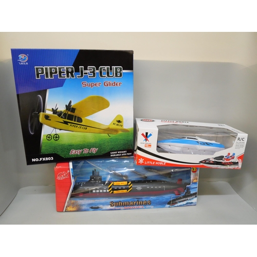 2108 - A Revell model HMCS Snowberry, a Palamos model, a Super Glider, a battery operated Submarine and a H... 