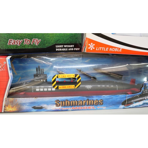 2108 - A Revell model HMCS Snowberry, a Palamos model, a Super Glider, a battery operated Submarine and a H... 