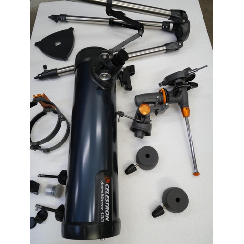 2109 - A Celestron Astromaster 130 telescope, includes 10mm and 20mm lenses, (fully working and complete)