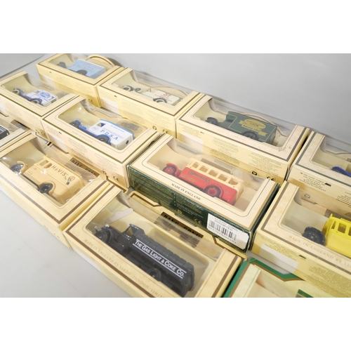 2129 - A box of 30 Lledo Days Gone commercial vehicles and buses, boxed