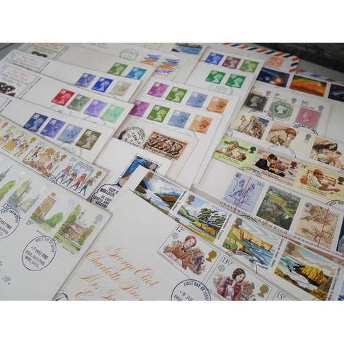 2132 - Stamps; a box of stamp albums, covers, etc.