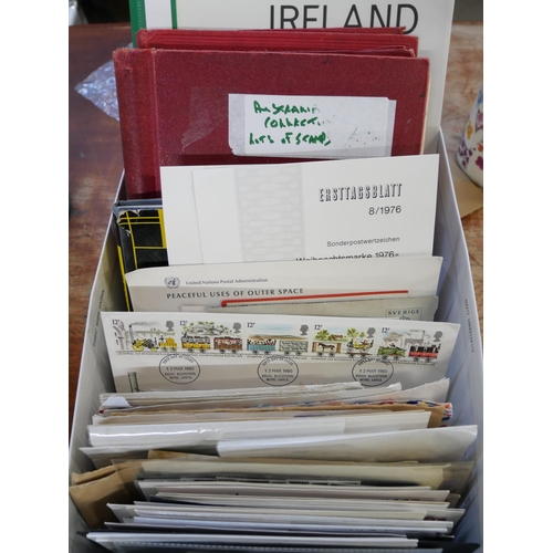 2132 - Stamps; a box of stamp albums, covers, etc.